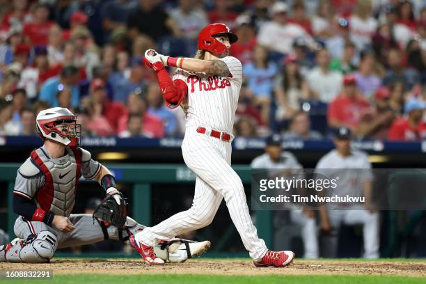 Bryson Stott of the Philadelphia Phillies hits a solo home run during the sixth inning against the Minnesota Twins at Citizens Bank Park on August...