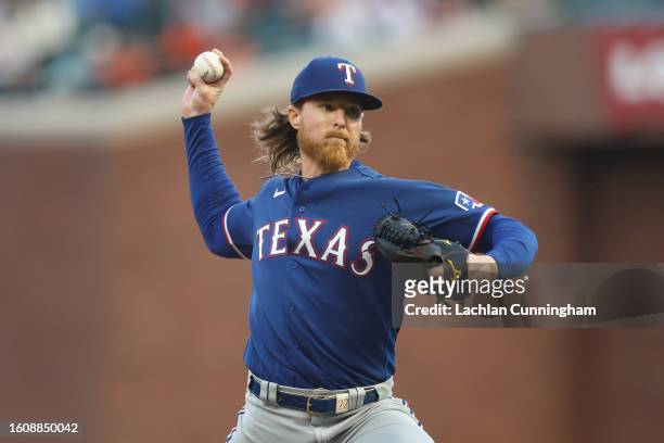 Jon Gray of the Texas Rangers pitches in the bottom of the first inning against the San Francisco Giants at Oracle Park on August 11, 2023 in San...