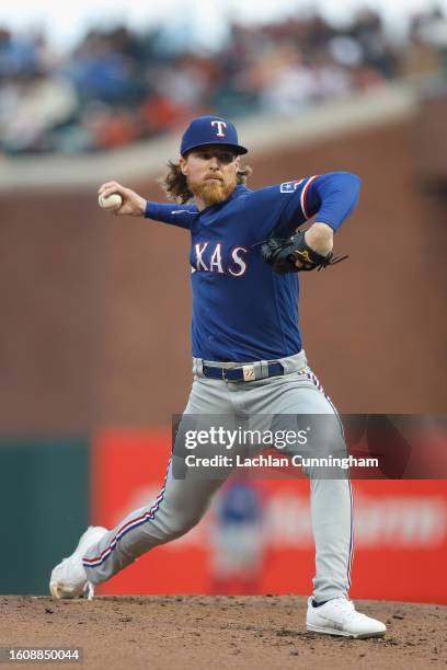 Jon Gray of the Texas Rangers pitches in the bottom of the first inning against the San Francisco Giants at Oracle Park on August 11, 2023 in San...