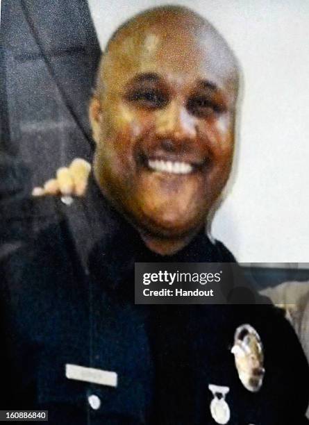 In this handout picture provided by Los Angeles Police Department , the alleged suspect Christopher Dorner is seen on February 7, 2013 in Los...