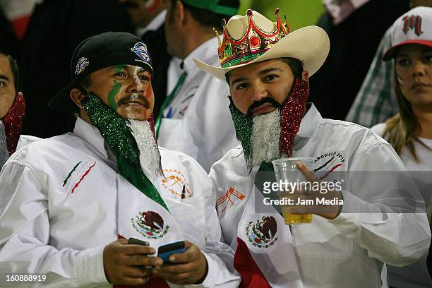 Supporters of Mexico watch a match between Mexico and Puerto Rico for the Caribbean Series 2013 on February 6, 2013 in Hermosillo, Mexico.