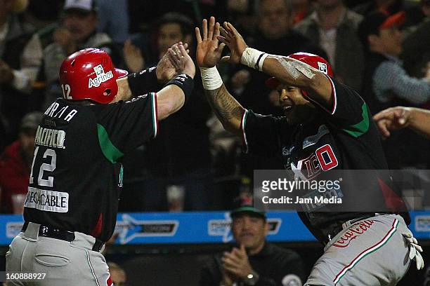 Karim Garcia and Marlon Byrd of Mexico celebrates during a match between Mexico and Puerto Rico for the Caribbean Series 2013 on February 6, 2013 in...