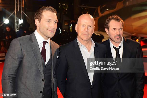 Jai Courtney, Bruce Willis and Sebastian Koch attend the UK premiere of 'A Good Day To Die Hard' at The Empire Leicester Square on February 7, 2013...