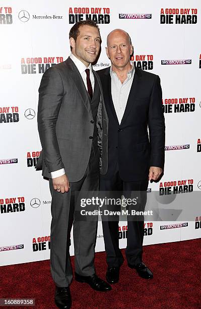 Actors Jai Courtney and Bruce Willis attend the UK Premiere of 'A Good Day To Die Hard' at Empire Leicester Square on February 7, 2013 in London,...