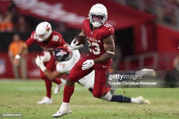 Running back Corey Clement of the Arizona Cardinals rushes the football against the Denver Broncos during the first half of the NFL game at State...