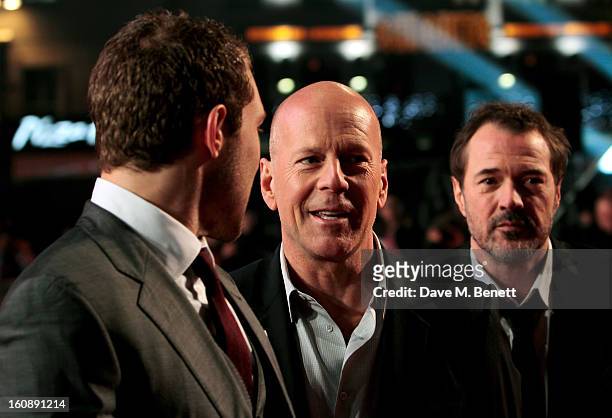 Jai Courtney, Bruce Willis and Sebastian Koch attend the UK Premiere of 'A Good Day To Die Hard' at Empire Leicester Square on February 7, 2013 in...