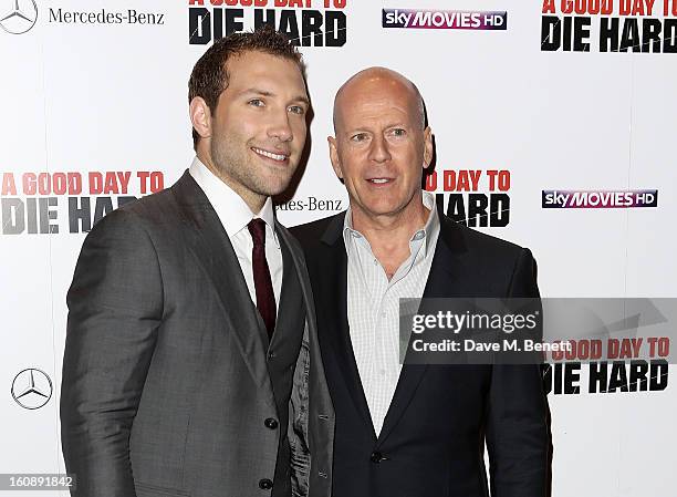 Actors Jai Courtney and Bruce Willis attend the UK Premiere of 'A Good Day To Die Hard' at Empire Leicester Square on February 7, 2013 in London,...