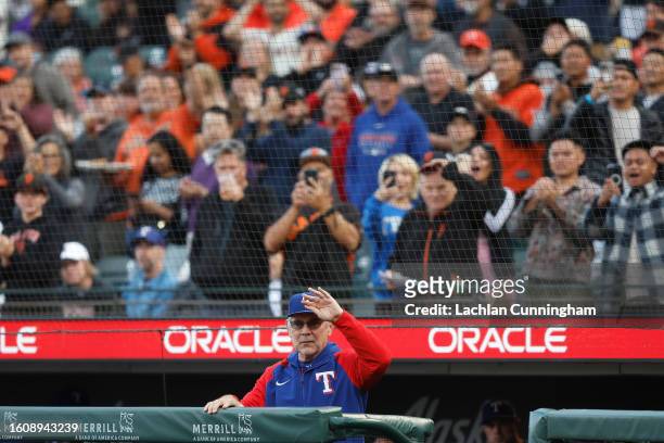 Manager Bruce Bochy of the Texas Rangers acknowledges fans as he is introduced before the game against the San Francisco Giants at Oracle Park on...