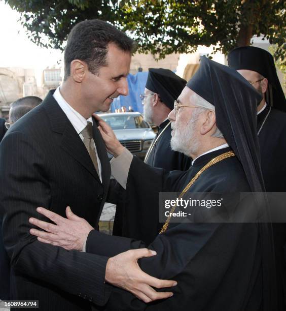 Syrian President Bashar al-Assad greets Greek Orthodox Patriarch of Antioch and All the East, Ignatius IV Hazim in Damascus, 25 December 2006. Assad...