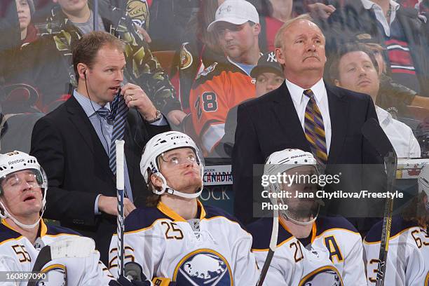 Assistant coach Kevyn Adams and head coach Lindy Ruff of the Buffalo Sabres watch the action during an NHL game against the Ottawa Senators at...