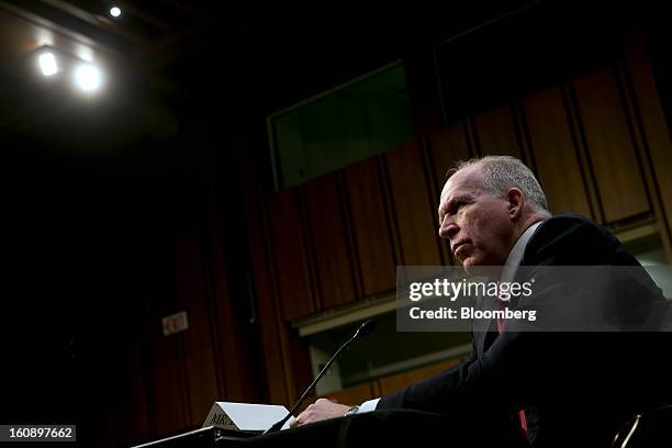 John Brennan, nominee for director of the Central Intelligence Agency and White House chief counterterrorism adviser, listens to a question during a...