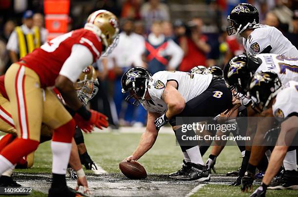 Center Matt Birk of the Baltimore Ravens readies to snap the ball at the line of scrimmage against the San Francisco 49ers during Super Bowl XLVII at...