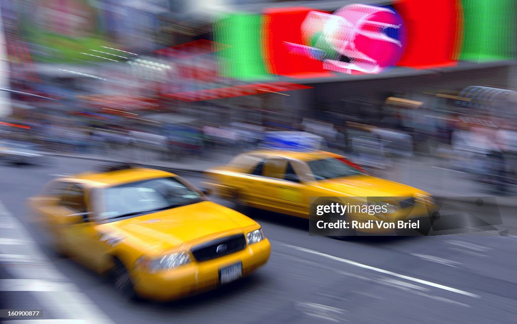 Taxi pan-blur in Times Square, NYC.