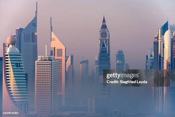 sheikh zayed road - emirates towers stock pictures, royalty-free photos & images