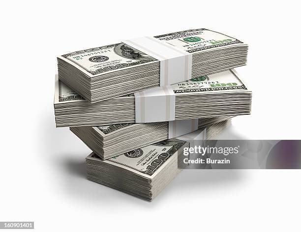 bundles of money - pila fotografías e imágenes de stock