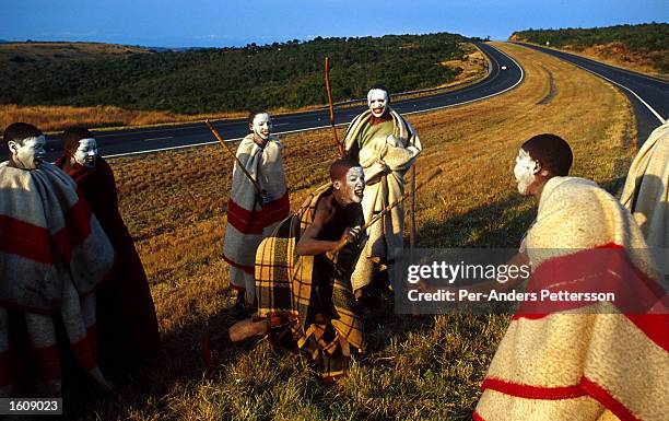 Young Xhosa boys practice traditional stickfighting during a manhood ritual by the N2 highway July 9, 2001in Mdantsane, Eastern Cape Province, South...