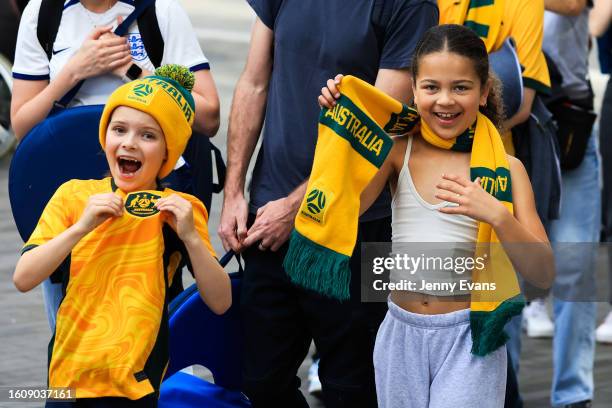 Matildas fans show off their colours as they line up at the Sydney FIFA Fan Festival ahead of the Matildas FIFA World Cup Game, being played in...