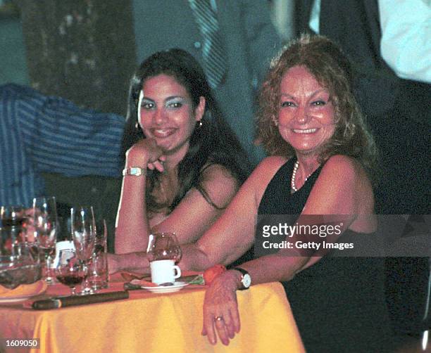 Dalia Soto del Valle sits with an unidentified friend during the Habanos SA event February 2001 at the Tropicana Cabaret, in Havana, Cuba. Soto del...