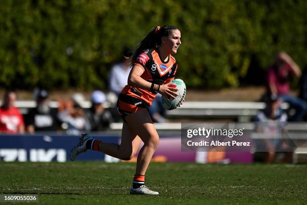 Rebecca Pollard of the Wests Tigers in action during the round four NRLW match between North Queensland Cowboys and Wests Tigers at Totally Workwear...