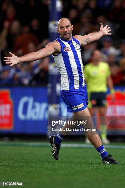 Ben Cunnington of the Kangaroos celebrates a goal during the round 22 AFL match between North Melbourne Kangaroos and Essendon Bombers at Marvel...