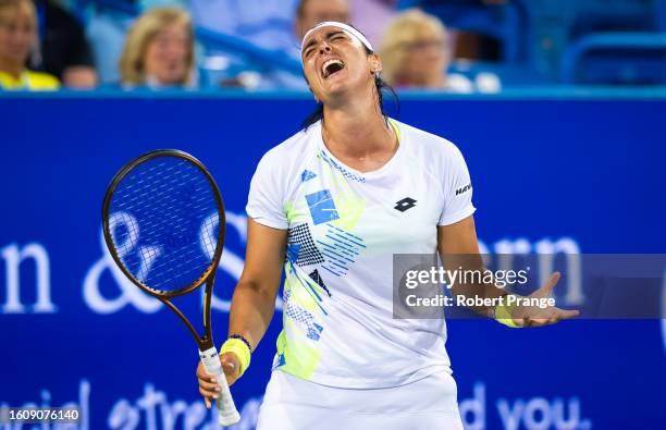 Ons Jabeur of Tunisia in action against Aryna Sabalenka during the women's singles quarterfinal match on Day 6 of the Western & Southern Open at...