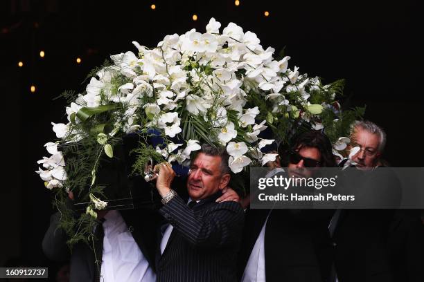 The coffin of Sir Paul Holmes is carried out at Auckland Cathedral of the Holy Trinity in Parnell on February 8, 2013 in Auckland, New Zealand....