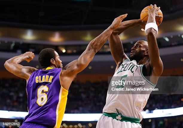 Kevin Garnett of the Boston Celtics takes a shot over Earl Clark of the Los Angeles Lakers in the second quarter during the game on February 7, 2013...