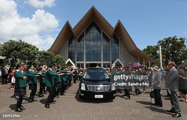 Karamu High School perform the Haka as the hearse drives away at Auckland Cathedral of the Holy Trinity in Parnell on February 8, 2013 in Auckland,...