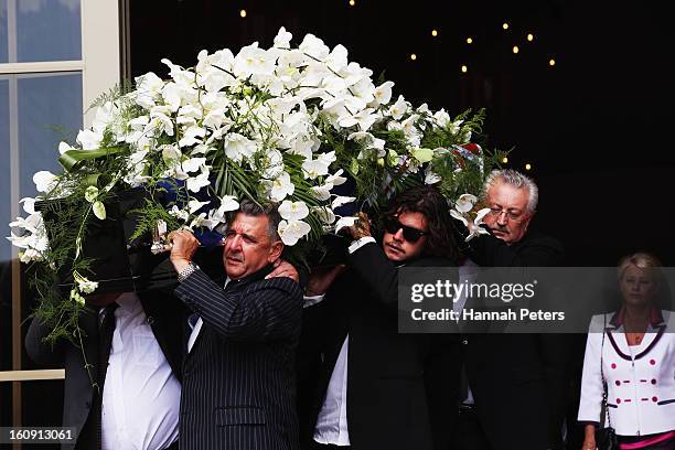 The coffin of Sir Paul Holmes is carried out at Auckland Cathedral of the Holy Trinity in Parnell on February 8, 2013 in Auckland, New Zealand....