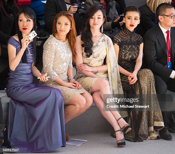 Chiu-ti Jansen, a guest, actress Zhang Meng and actress Gong Xiliang attend Tadashi Shoji during Fall 2013 Mercedes-Benz Fashion Week at The Stage at...