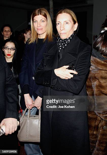 Virginia Smith, Fashion Market/Accessories Director at Vogue, and Tonne Goodman stand backstage at the Edun Fall 2013 fashion show during...