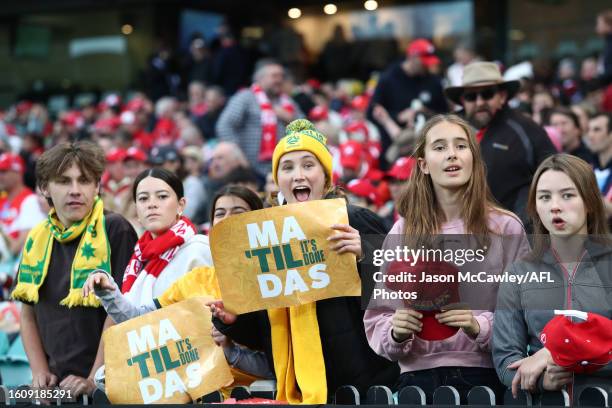 Fans watch the Matildas' FIFA Women's World Cup Quarter Final match between Australia and France following the round 22 AFL match between Sydney...