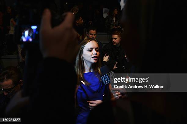 Actress Christina Ricci attends the Richard Chai Love & Richard Chai Men's Fall 2013 fashion show during Mercedes-Benz Fashion Week at Lincoln Center...