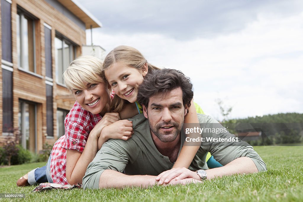 Germany, Bavaria, Nuremberg, Portrait of family in front of house