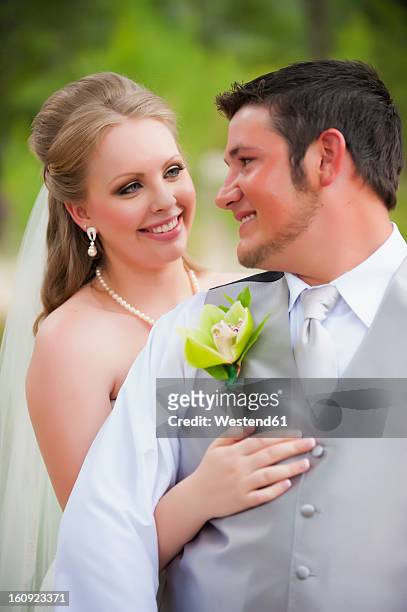 usa, texas, bride and groom smiling, close up - boutonniere ストックフォトと画像