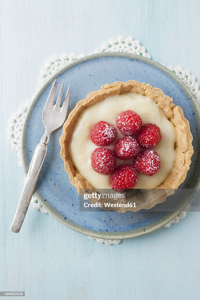 Plate of raspberry tart, close up