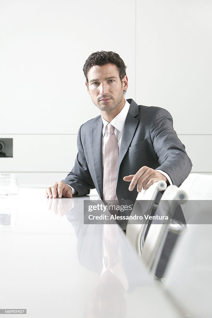 Portrait of businessman in meeting room