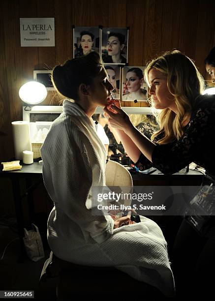 Model backstage during the La Perla fall 2013 presentation during Mercedes-Benz Fashion Week at The Gallery at The Dream Downtown Hotel on February...