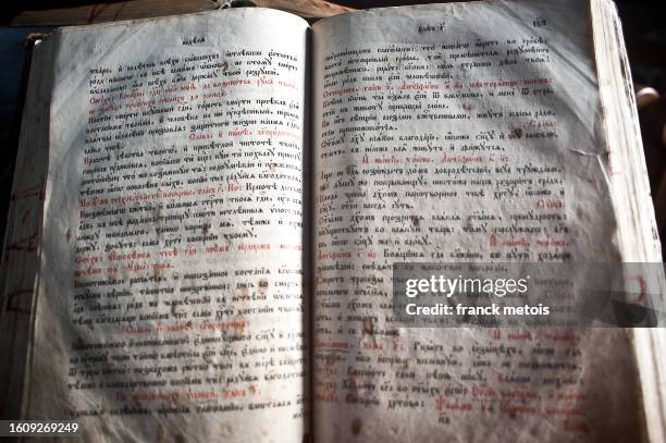 religious book in an orthodox monastery ( bulgaria) - association of religion data archives stock pictures, royalty-free photos & images