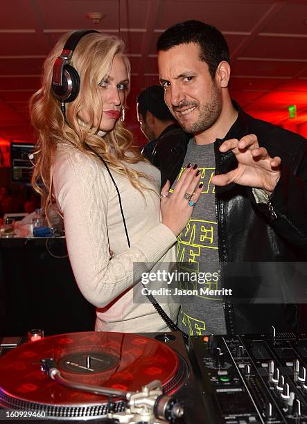 Model CariDee English and DJ Cobra attend Quattro Volte Vodka Preview with Taio Cruz at SLS Hotel on February 7, 2013 in Beverly Hills, California.