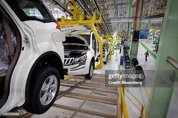 Vehicles move along the assembly line for the Mahindra & Mahindra Ltd. XUV 500 sport utility vehicle is seen at the company's factory in Chakan,...