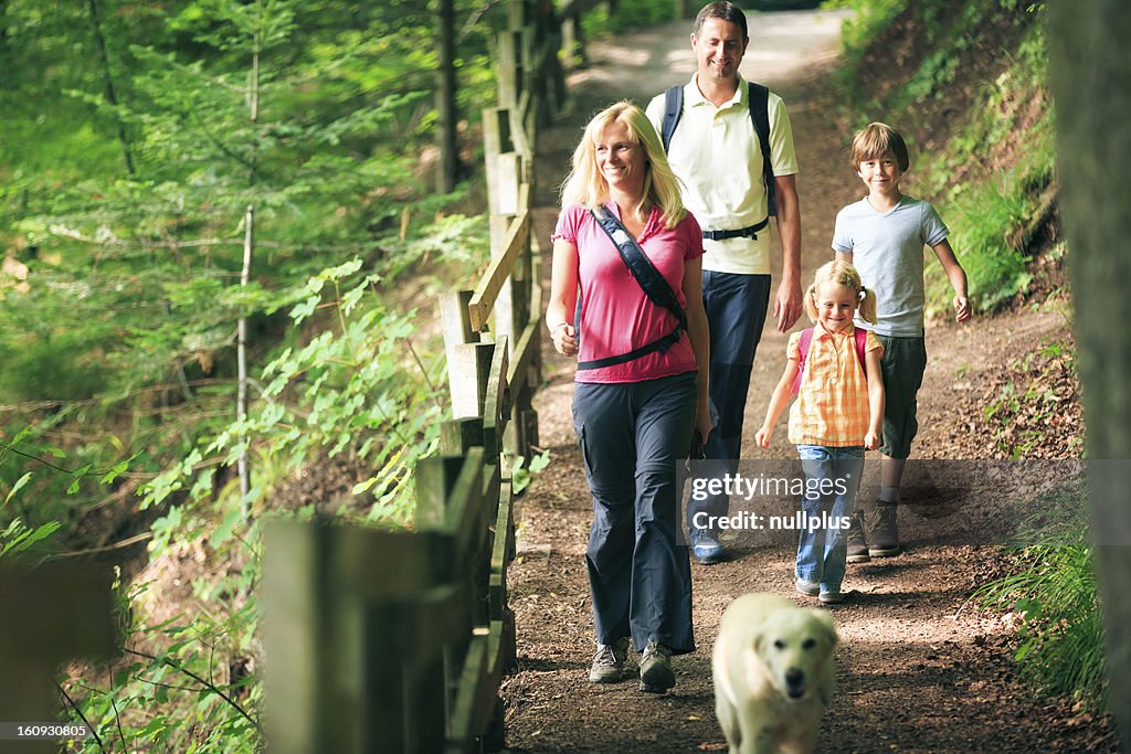 Family of four hiking