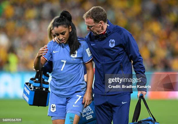 Sakina Karchaoui of France receives medical attention during the FIFA Women's World Cup Australia & New Zealand 2023 Quarter Final match between...