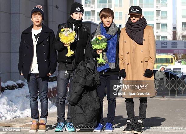 Attend Jong-Up's high school graduation at Hanlim Multi Art School on February 7, 2013 in Seoul, South Korea.