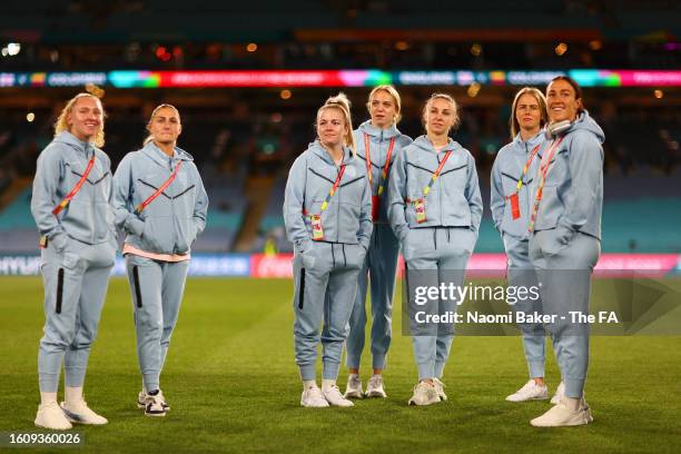 Katie Robinson, Laura Coombs, Lauren Hemp, Esme Morgan, Niamh Charles, Hannah Hampton and Lucy Bronze of England inspect the pitch prior to the FIFA...