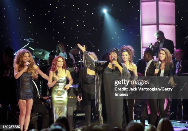 American musician Aretha Franklin performs with, from left, Mariah Carey, Gloria Estefan, Carole King , Shania Twain, and Celine Dion during the...