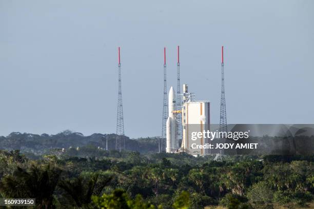 An Ariane 5 rocket carrying two satellites, Amazonas 3 and Azerspace/Africasat-1a, is pictured before blasting off on February 7, 2013 at the...