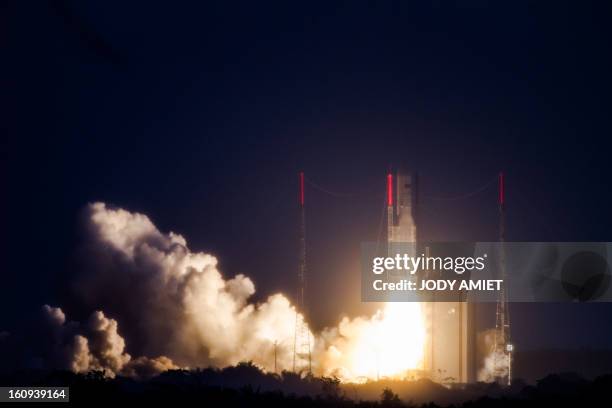 An Ariane 5 rocket carrying two satellites, Amazonas 3 and Azerspace/Africasat-1a, is pictured after blasting off on February 7, 2013 at the European...