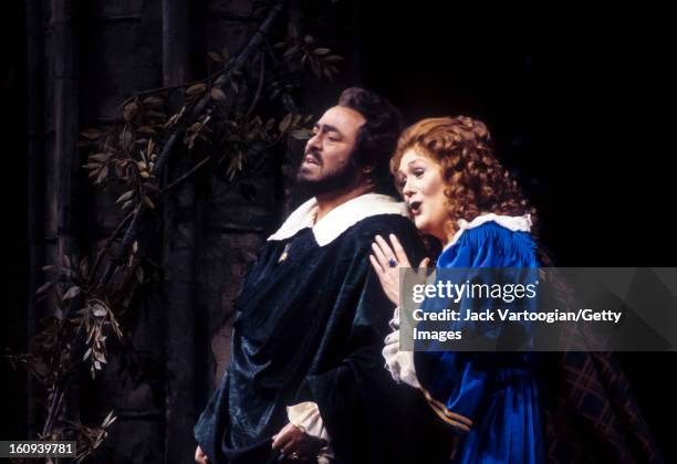 Australian soprano Dame Joan Sutherland and Italian tenor Luciano Pavarotti on stage in the Metropolitan Opera production of Gaetano Donizetti's...