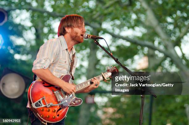 American rock musician Dan Auerbach of The Black Keys plays guitar and sings at a Benefit for Central Park SummerStage, New York, New York, July 27,...